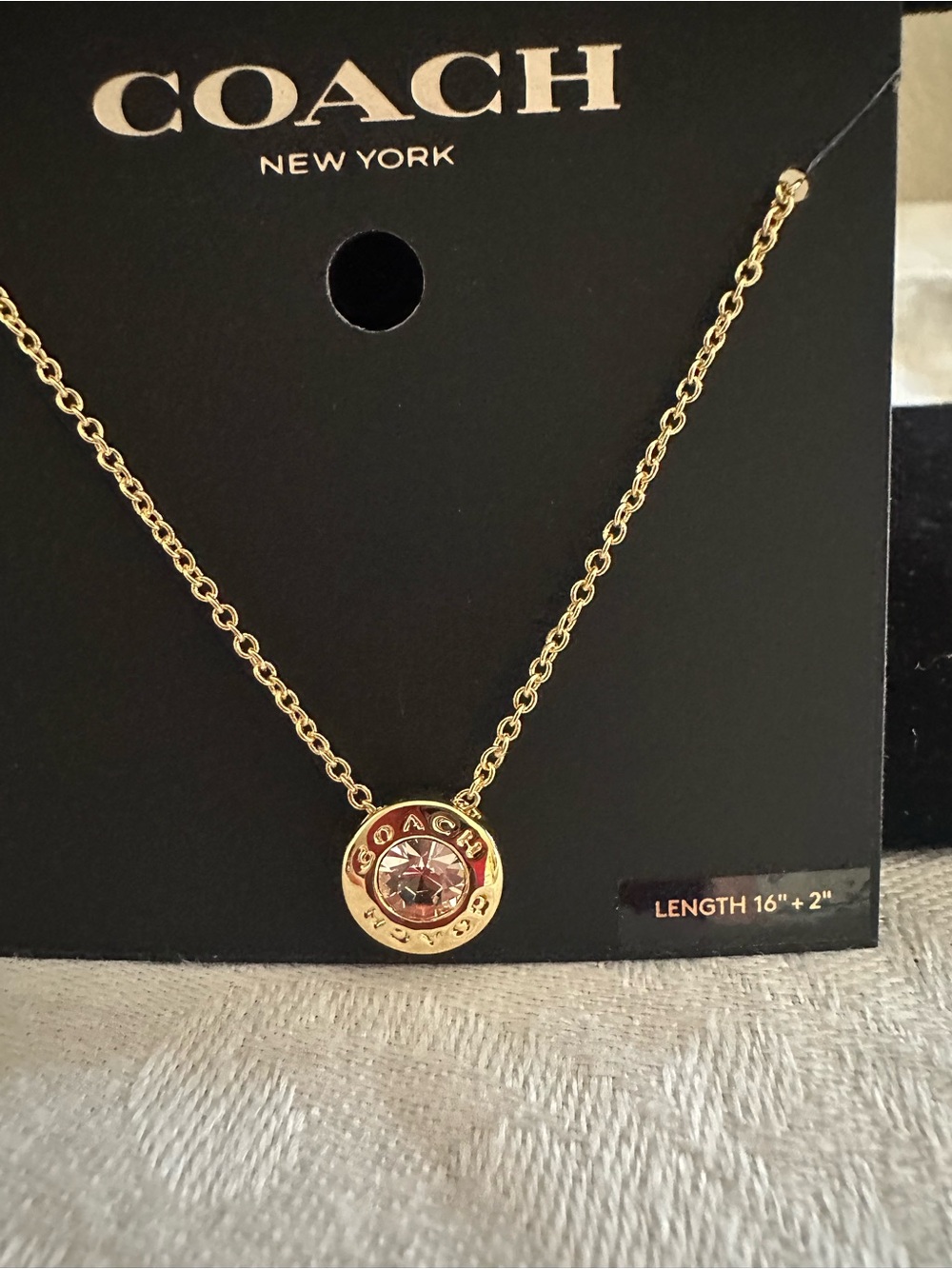 Coach Gold-Tone Necklace with Pink Crystal Pendant